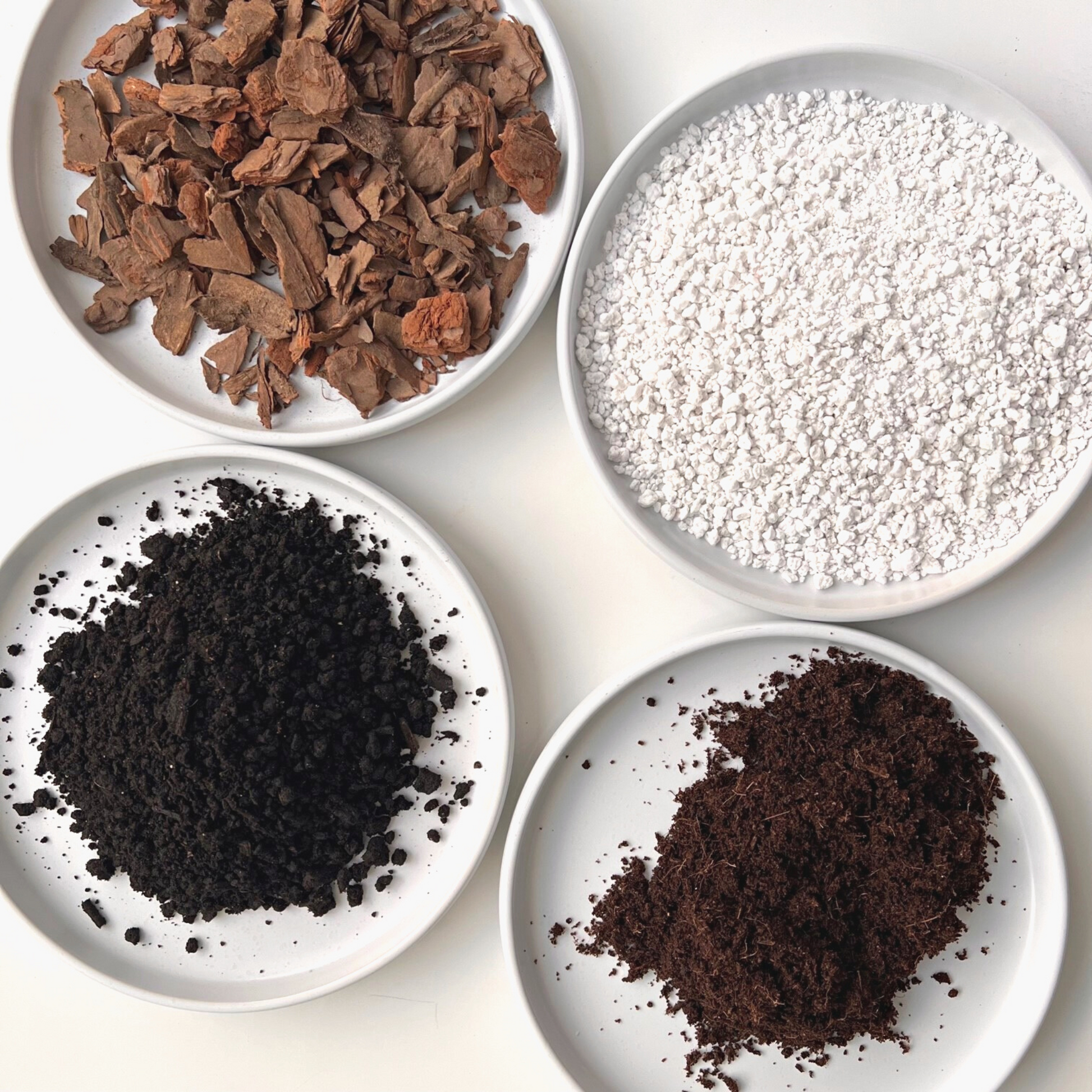 A ingredient makeup of Birdy's Plants Premium Hoya Soil Mix including orchid bark, coarse perlite, worm castings, and coco coir.